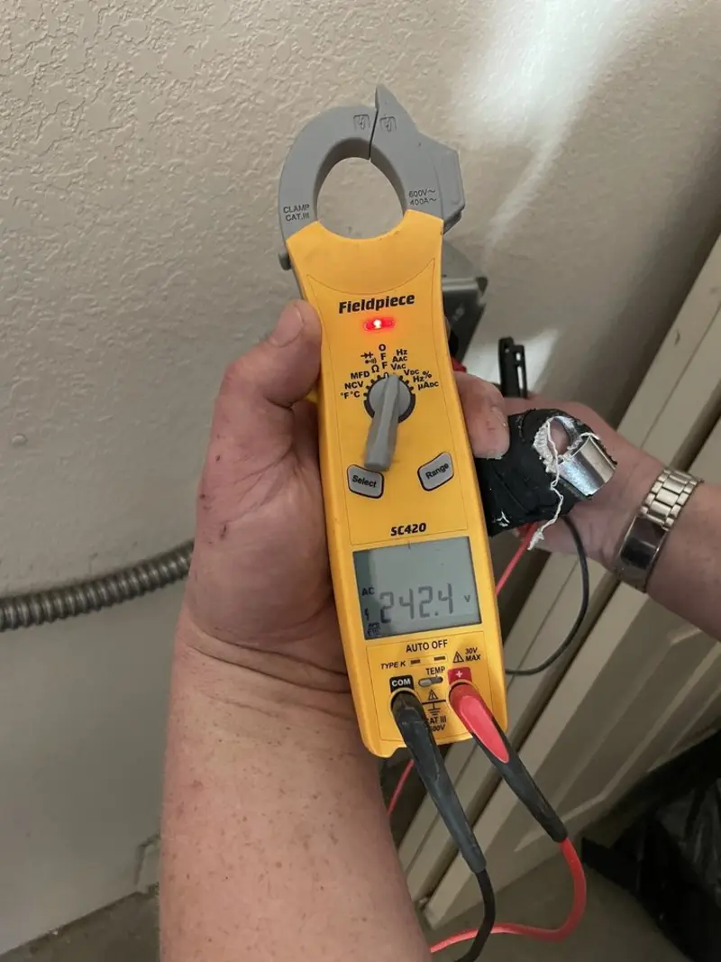 Voltage testing with clamp meter during Hot Tub / Pool Electrical Wiring in Middlesex